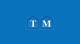 T M Roofing & Building